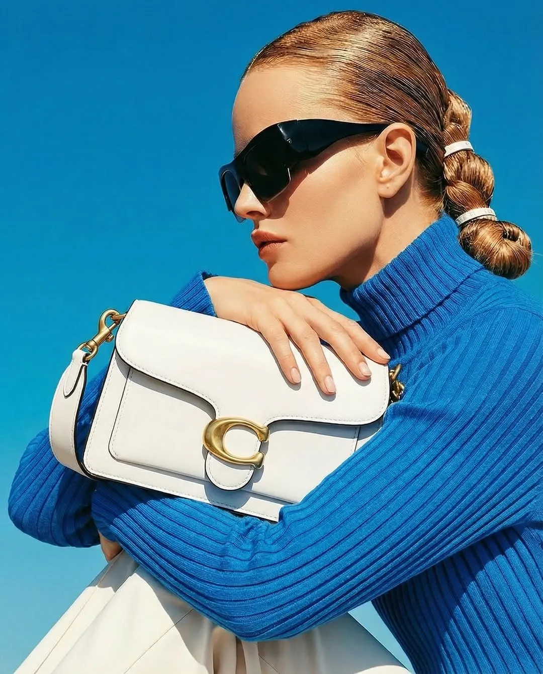 Coach bags, reimagined by AI.